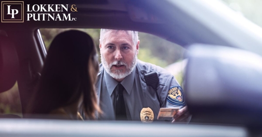 police officer talking to female driver