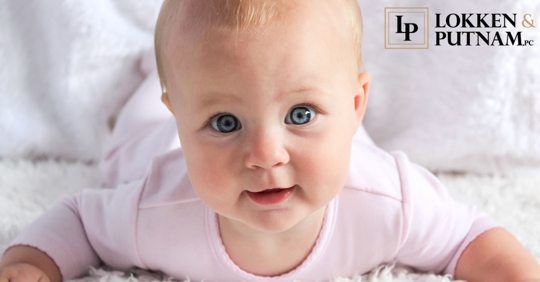 young baby looking at camera